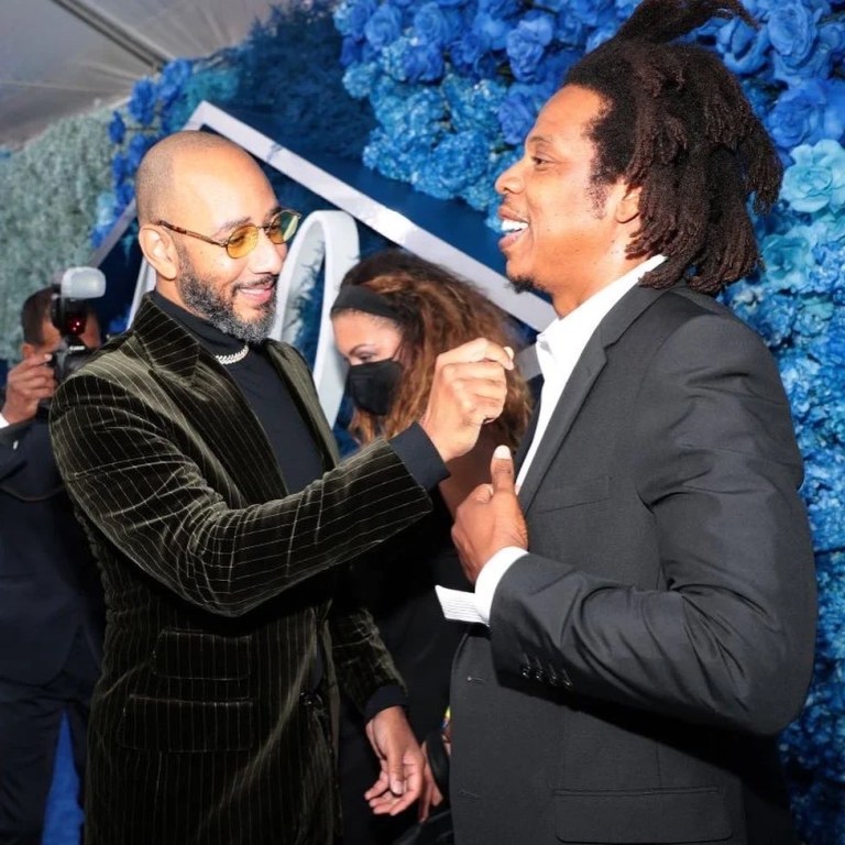 On the Scene at Jay-Z’s 40/40 Club Anniversary Party in NYC: Beyoncé in Versace Pink and Black Look, Megan Thee Stallion in Khaite White Off-The-Shoulder Dress, JT in Rick Owens White Jumpsuit+ More