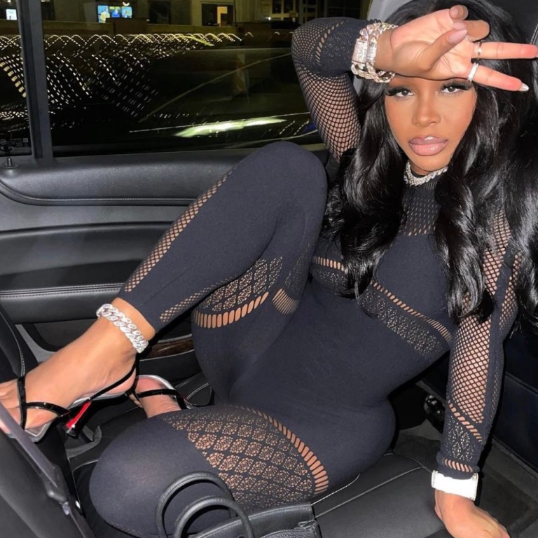 Wardrobe Inquiry: Jayda Cheaves Attends Second Kanye West’s ‘DONDA’ Listening Party Wearing Wolford Black Cutout Jumpsuit, Hermès Bag, and Christian Louboutin Patent Leather Thong Sandals