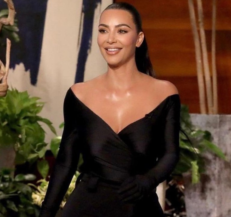 Kim Kardashian Appears on ‘The Ellen Show’ Wearing Balenciaga Black Off-the-Shoulder Gathered Top and Pantashoes