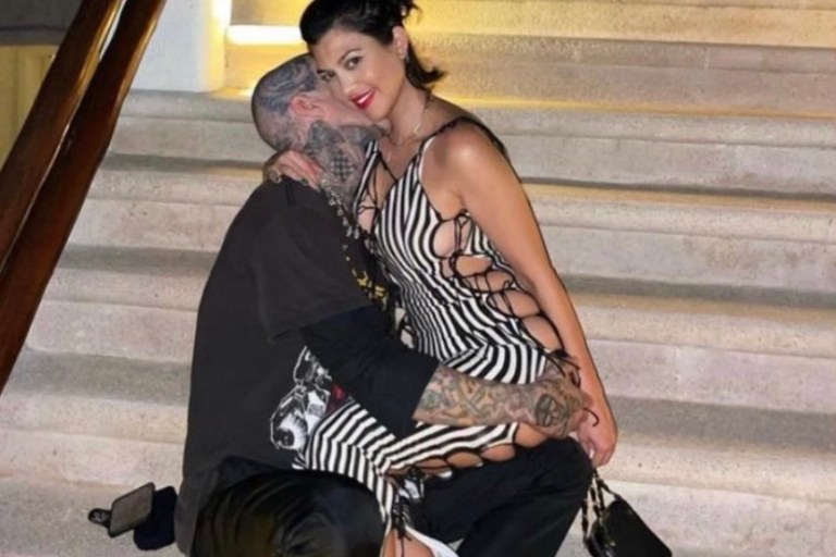 Kourtney Kardashian Wears Fanci Club Black and White Striped Cutout Dress to Dinner in Mexico with Boyfriend Travis Barker
