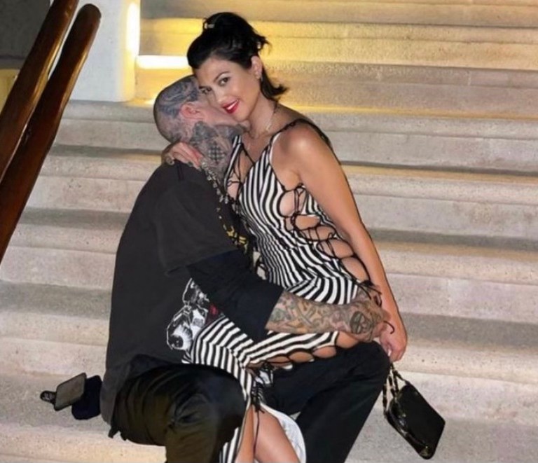 Kourtney Kardashian Wears Fanci Club Black and White Striped Cutout Dress to Dinner in Mexico with Boyfriend Travis Barker