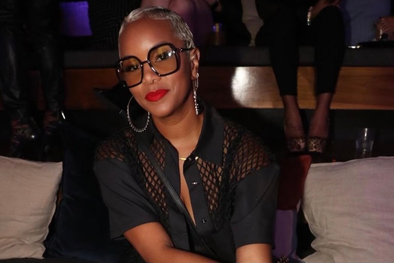 Most Requested: LeToya Luckett Attends ‘Power Book III: Raising Kanan’ Finale Event Wearing Black Fishnet Short Sleeve Shirt From Shop J. Bolin, Jacquemus Black Biker Shorts, and Gianvito Rossi Black PVC Strip Booties