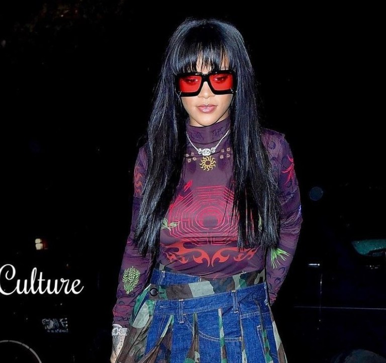 Rihanna Brings Back the Skirt-Pants Combo With New Look Featuring Marine Serre Tattoo Print Top, Junya Watanabe Camo-Denim Pleated Skirt, and Matthew Adams Dolan Cargo Pants