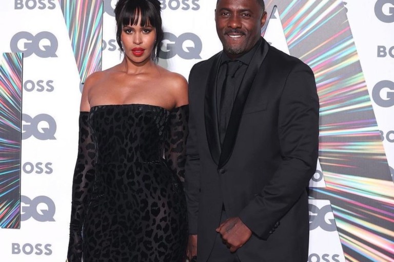 Sabrina Elba Stuns in Alex Perry Black Velvet Off-Shoulder Leopard Print Dres at GQ Awards 2021 With Idris Elba