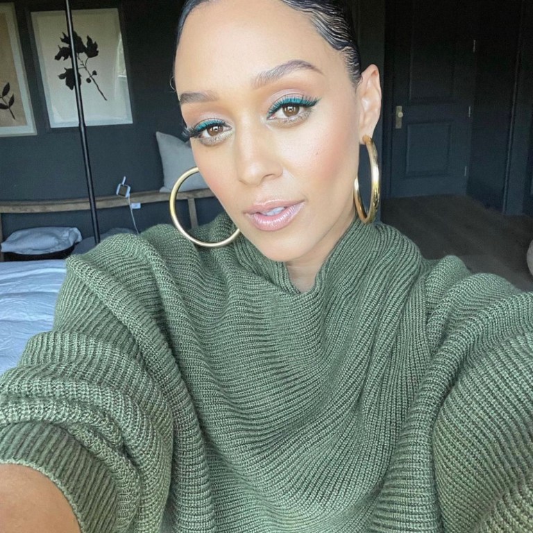 Wardrobe Inquiry: Tia Mowry Is Fall-Ready in Olive Green Look Including Alice and Olivia Crossover Sweater