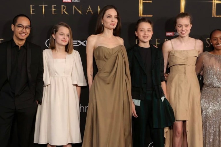 Angelina Jolie Attends LA Premiere of ‘Eternals’ With Her Kids, Wearing Balmain Resort 2022 Brown Draped Corset and Pants Look + Zahara Jolie-Pitt Rocks Mom’s 2014 Oscars Dress by Elie Saab