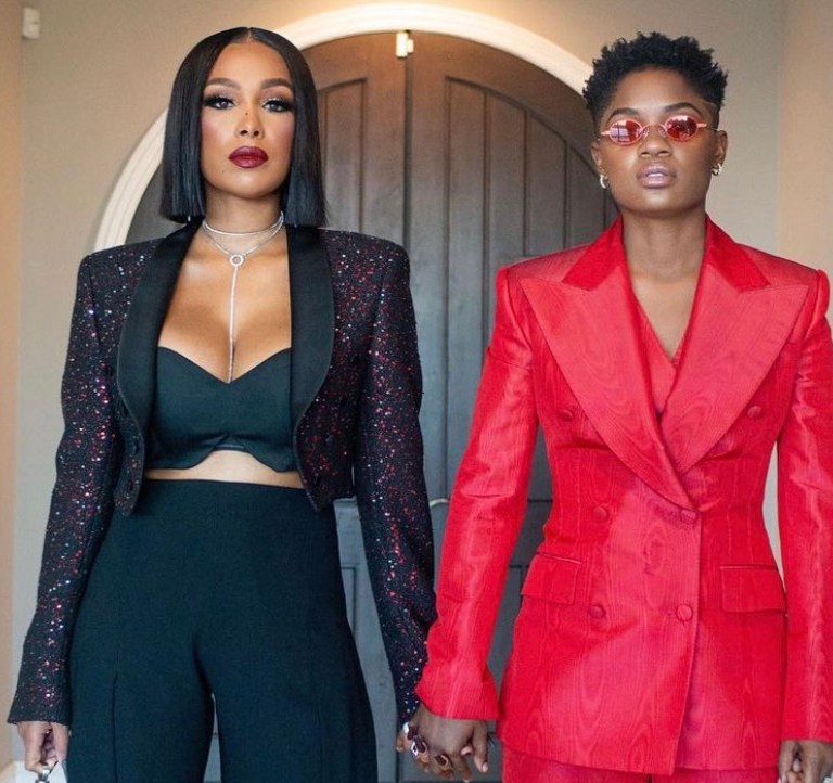Bre-Z and Chris Amore Supply Bomb Couple Style Moment at the ‘The Harder They Fall’ Premiere in LA: Bre-Z Wears Dolce and Gabbana Red Suit and Chris Wears Saint Laurent Black Look