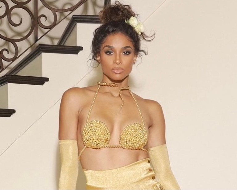 Ciara Continues to Celebrate Her Birthday Sharing Another Archive Dolce and Gabbana Look Featuring Spring/Summer 1992 Gold Beaded Ensemble