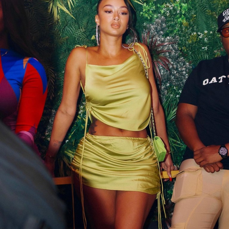 Draya Michele Hosts Party at Abigail Night Club Wearing Fashion Nova Lime Green Satin Skirt Set