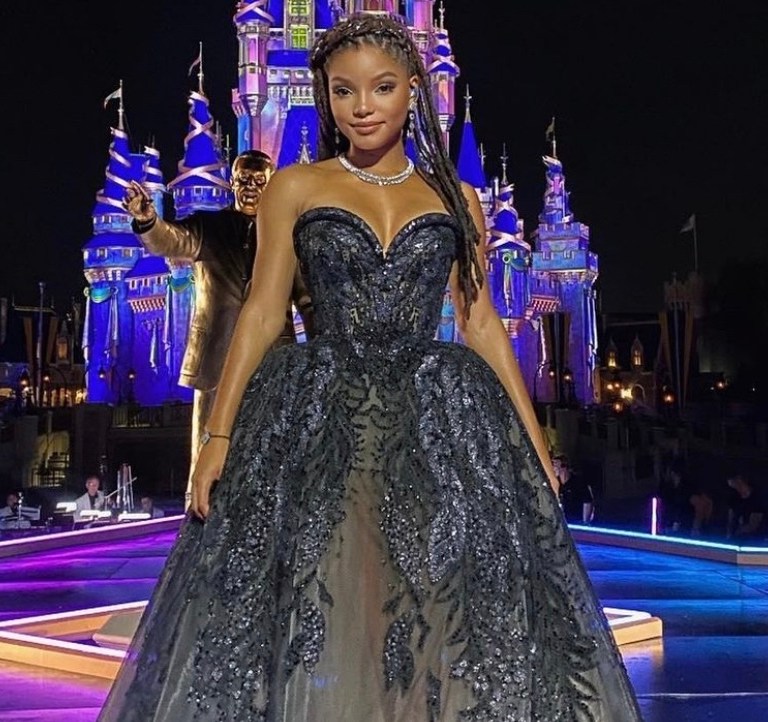 Halle Bailey Taps Into Her Inner Disney Princess Wearing Elie Saab Spring 2021 Couture Black Strapless Gown at Disney’s ‘The Most Magical Story on Earth: 50 Years of Walt Disney World’