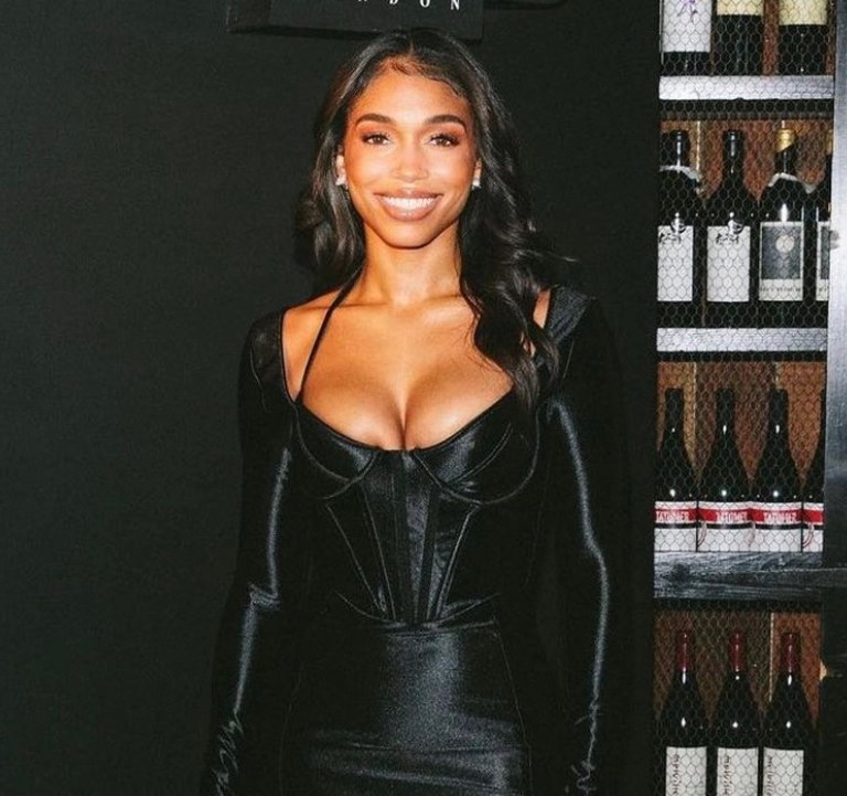 Lori Harvey Attends House of CB’s Black Orchid Collection Dinner Wearing Black Satin Corset Dress by the Brand