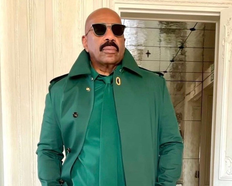 Steve Harvey Wears Green Bottega Veneta Look During Trip to Paris