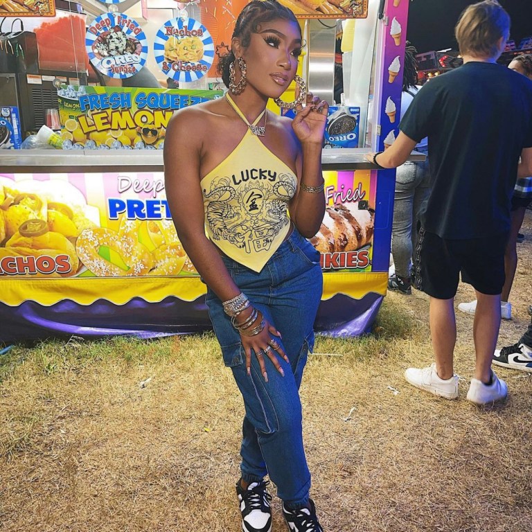 Ti Taylor Visits the State Fair Wearing Fashion Nova Neon Graphic Halter Top