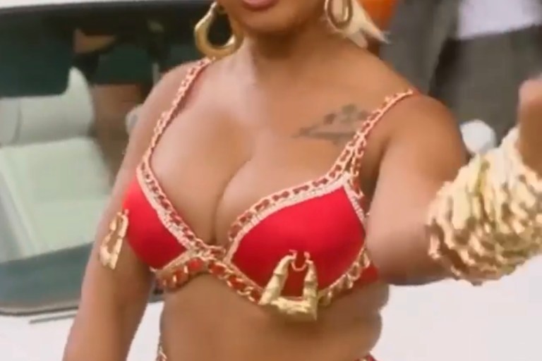 Yung Miami Channels Her Inner Freaknik With Custom Laurel DeWitt Red Chain and Tassel Look for ‘Strub tha Ground’ Video With Quavo