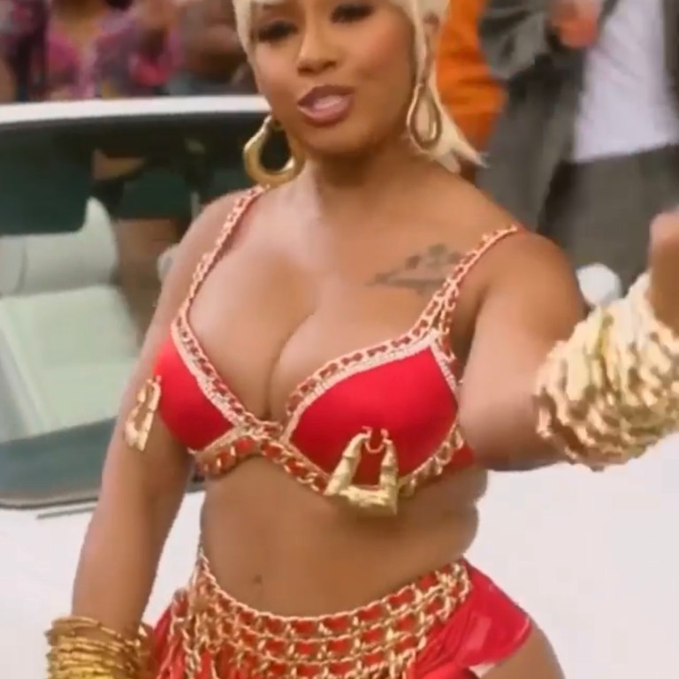 Yung Miami Channels Her Inner Freaknik With Custom Laurel DeWitt Red Chain and Tassel Look for ‘Strub tha Ground’ Video With Quavo