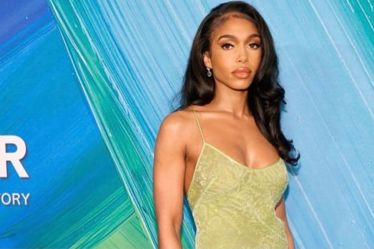 Lori Harvey Wears Vintage Roberto Cavalli Fall/Winter 1999 Green Fur Hem Dress to the 2021 amfAR Gala