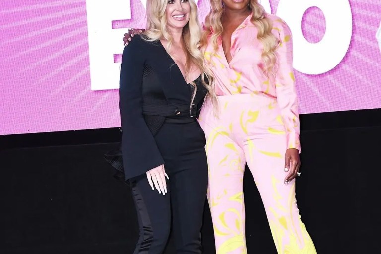 Nene Leakes Reunites with Kim Zolciak at the Ultimate Women’s Expo in Emilio Pucci Dinamica Pink and Yellow Blouse and Pants Set