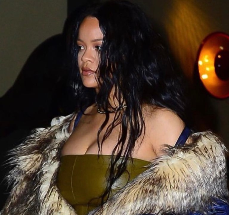 Rihanna Wears Prada Fur Nylon Raincoat, Rosetta Getty Green Strapless Leather Top, Ripped Jeans, and Tom Ford Snakeskin Padlock Sandals While Out in NYC