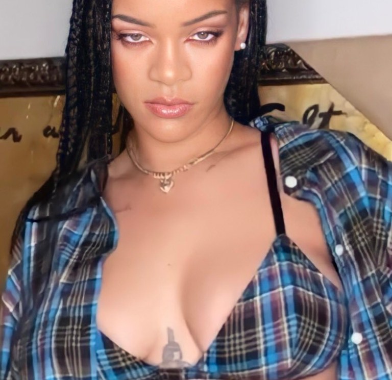 Rihanna Wows in Savage X Fenty Plaid Look Including Bralette, Lace-Up Sleeve Sleep Shirt, Slit-Side Shorts, and Open-Back Pants