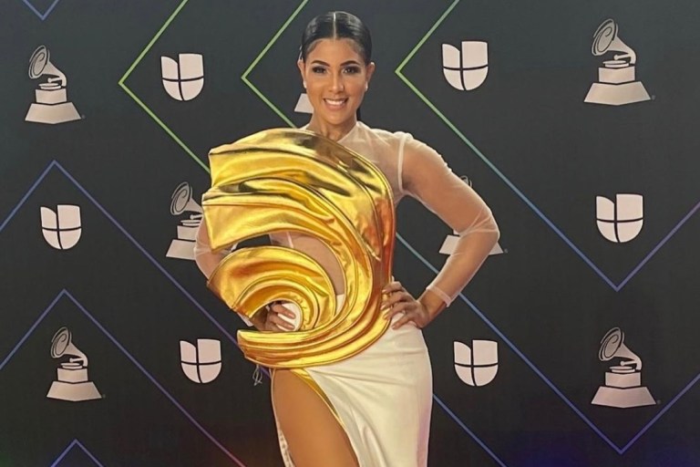 Sarodj Stuns at 2021 Latin Grammys Wearing Jovana Louis White and Gold Leather Gown