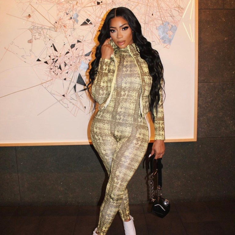 Tommie Stuns in Fashion Nova Olive Puffer Vest and Jumpsuit Set