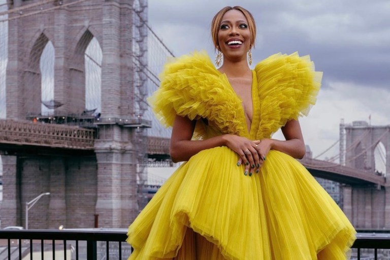 Yvonne Orji Hosts 2021 International Emmy Awards Wearing Nicole + Felicia Yellow Tulle Gown