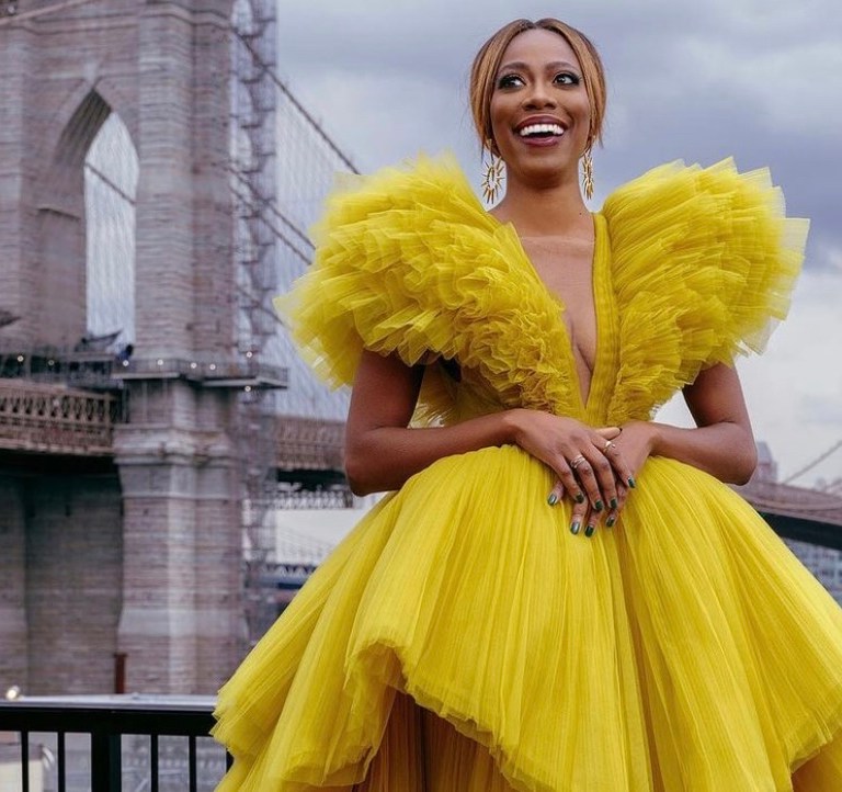 Yvonne Orji Hosts 2021 International Emmy Awards Wearing Nicole + Felicia Yellow Tulle Gown