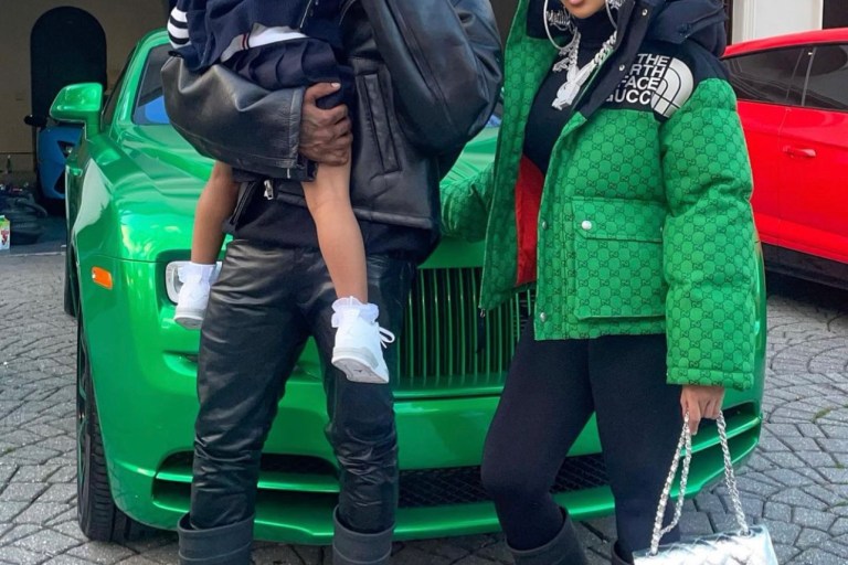 Cardi B and Offset Rock Matching Balenciaga x Crocs Black Boots While Attending Bulls and Hawks Game in Atlanta: Cardi B Pairs Her Boots with Gucci x North Face Green Black Logo Jacket