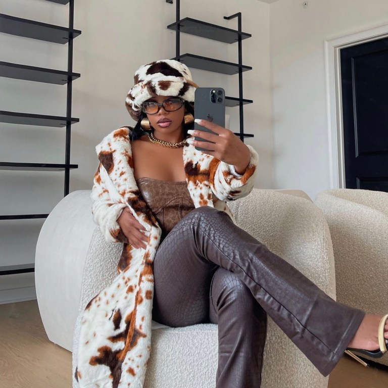 De’arra Taylor Stuns in Fashion Nova Cow Print Faux Fur Coat