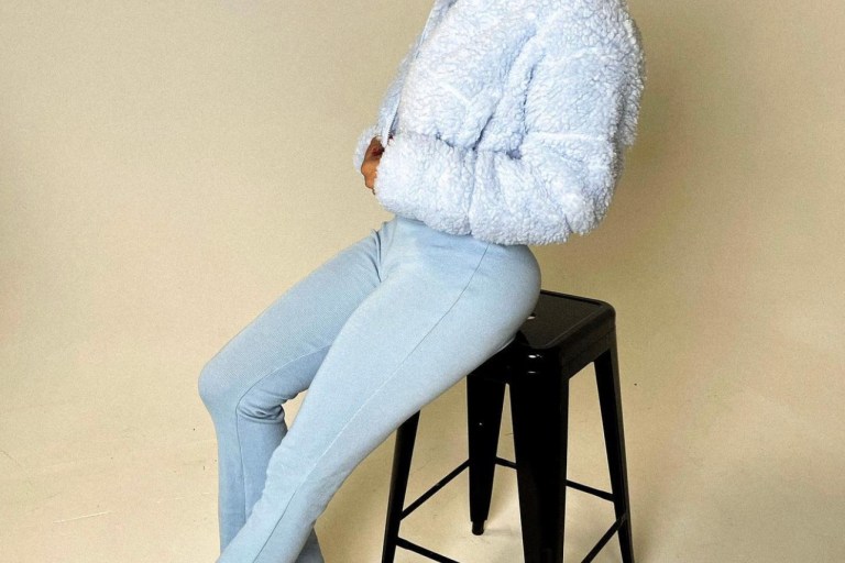 Draya Michele Wears Blue Outfit Featuring Fashion Nova Blue Sherpa Puffer Jacket