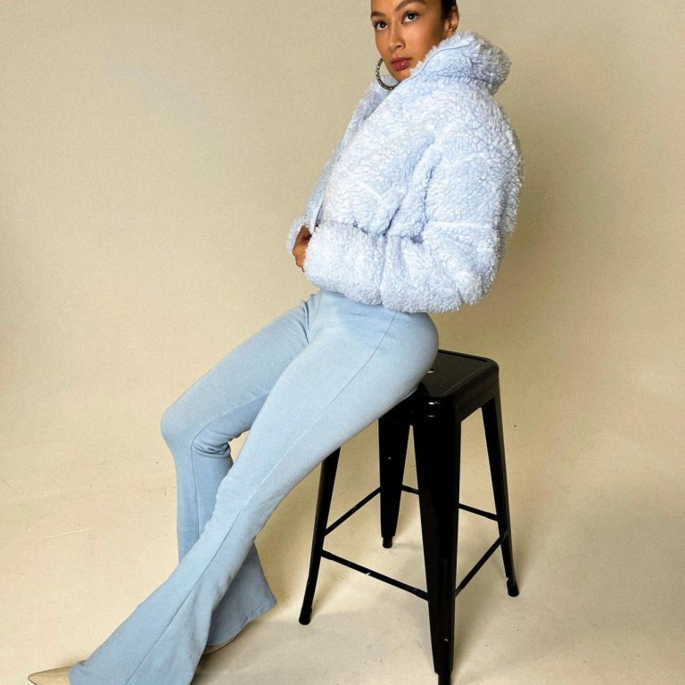Draya Michele Wears Blue Outfit Featuring Fashion Nova Blue Sherpa Puffer Jacket