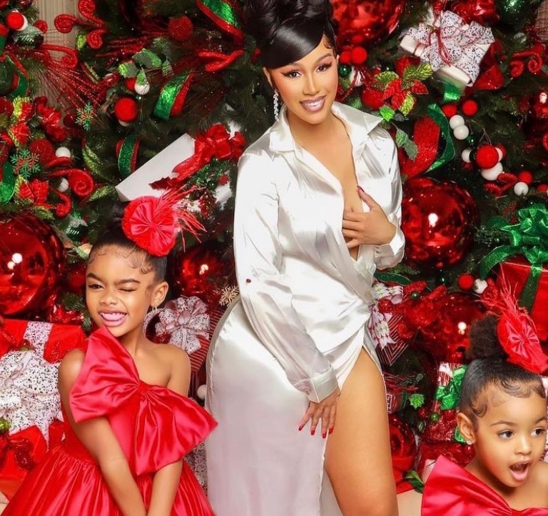 Fashion Bomb Families Celebrate the Holidays in Style: Mariah Carey and Family in Dolce and Gabbana Red Plaid Pajamas, Cardi B in JLUXLABEL White Plunge Satin Maxi Dress with Kulture and Kalea in Red Satin Bow Detail Dresses, Monique and Melvin Rodriguez’s Family in Skims Brown Fuzzy Sets + More