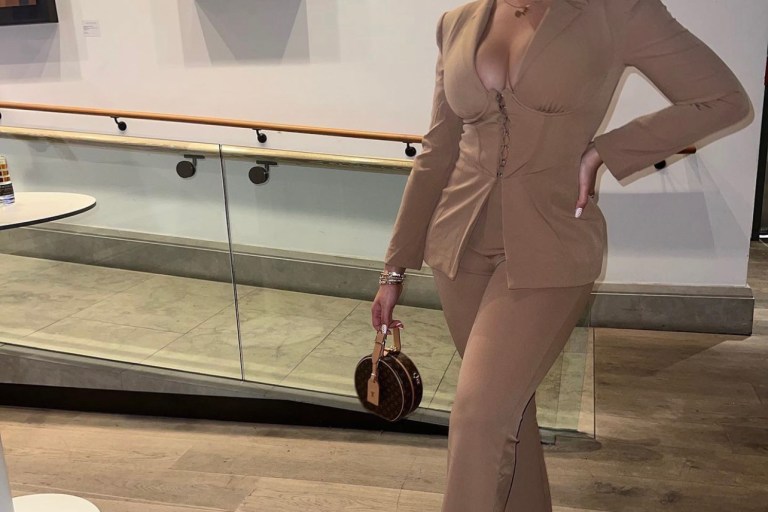 Jordyn Woods Shows Us She Means Business Wearing Fashion Nova Beige Corset-Style Pantsuit