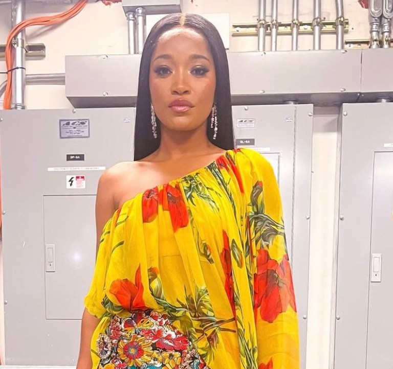 Keke Palmer Appears on ‘The Tonight Show’ With Jimmy Fallon Wearing Dolce and Gabbana Yellow Floral Print One-Shoulder Top and Embellished Mini Skirt