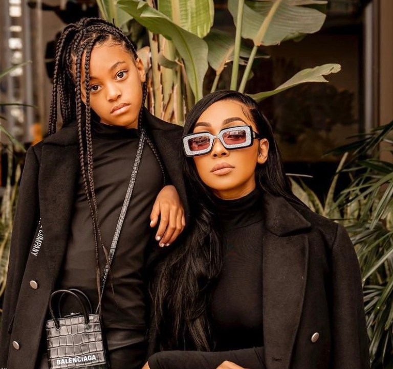 Monica and Daughter Laiyah Get Fly Together in Matching Black Milano Di Rouge Black Trench Coats