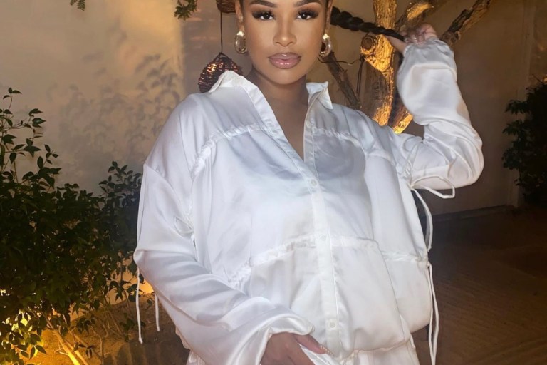 Taina Williams Stuns in Fashion Nova White Ruched Satin Mini Dress