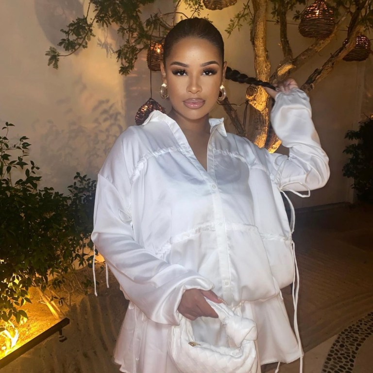 Taina Williams Stuns in Fashion Nova White Ruched Satin Mini Dress