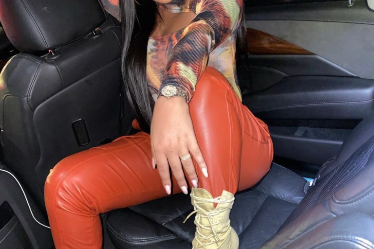 Taina Williams Wears Fashion Nova Burnt Orange Faux Leather Cargo Pants for Night Out