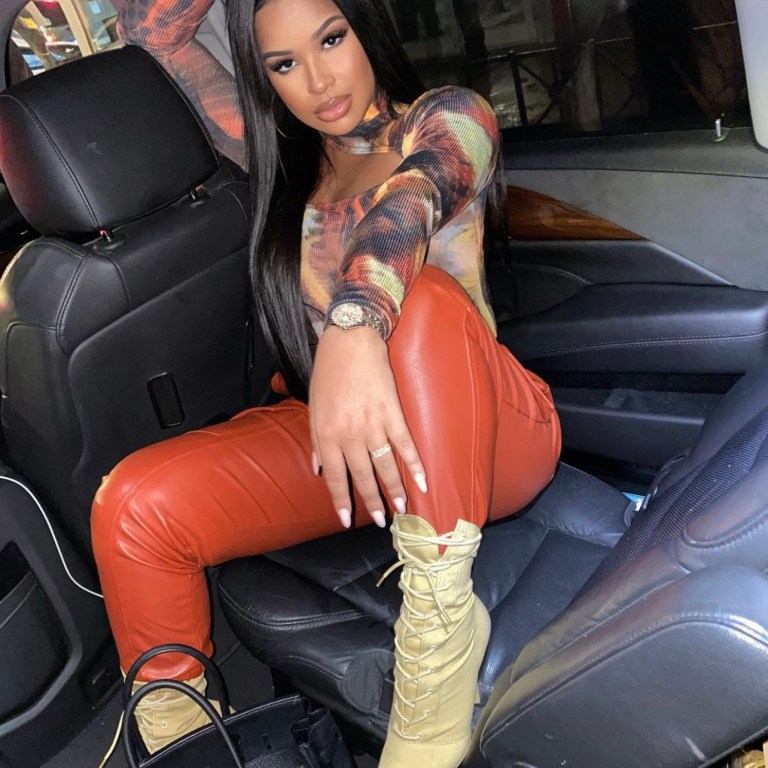 Taina Williams Wears Fashion Nova Burnt Orange Faux Leather Cargo Pants for Night Out