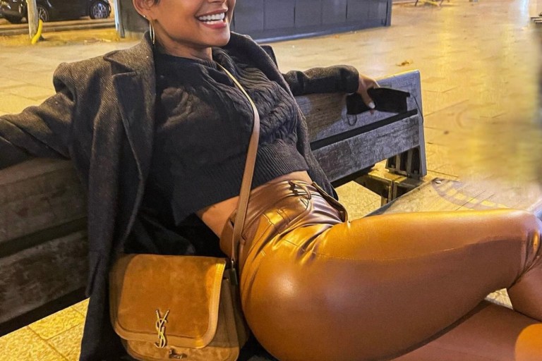 Christina Milian Enjoys Night Out in Paris Wearing Fashion Nova Navy Cable Knit Plaid-Sleeves Top