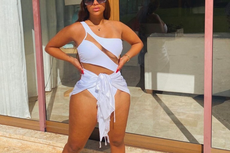 Cyn Santana Rocks Fashion Nova White Cutout Mesh One-Piece Swimsuit While on Vacation