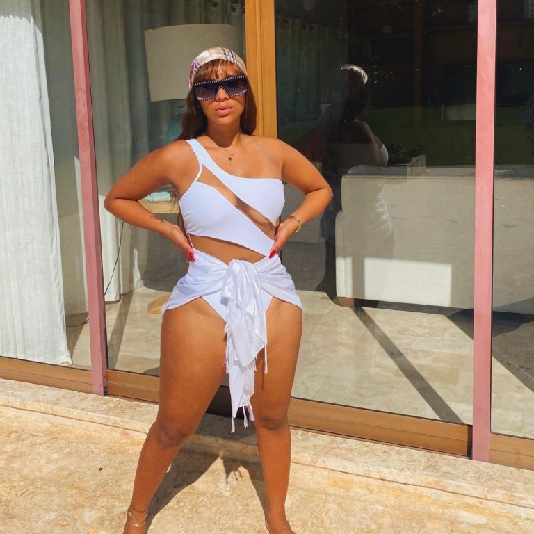 Cyn Santana Rocks Fashion Nova White Cutout Mesh One-Piece Swimsuit While on Vacation