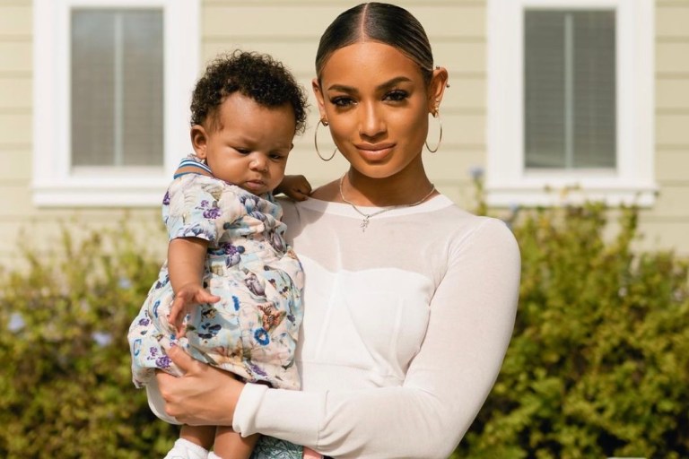 Wardrobe Inquiry: DaniLeigh Poses with Daughter Wearing Lela Rose Floral Print Patchwork Pants