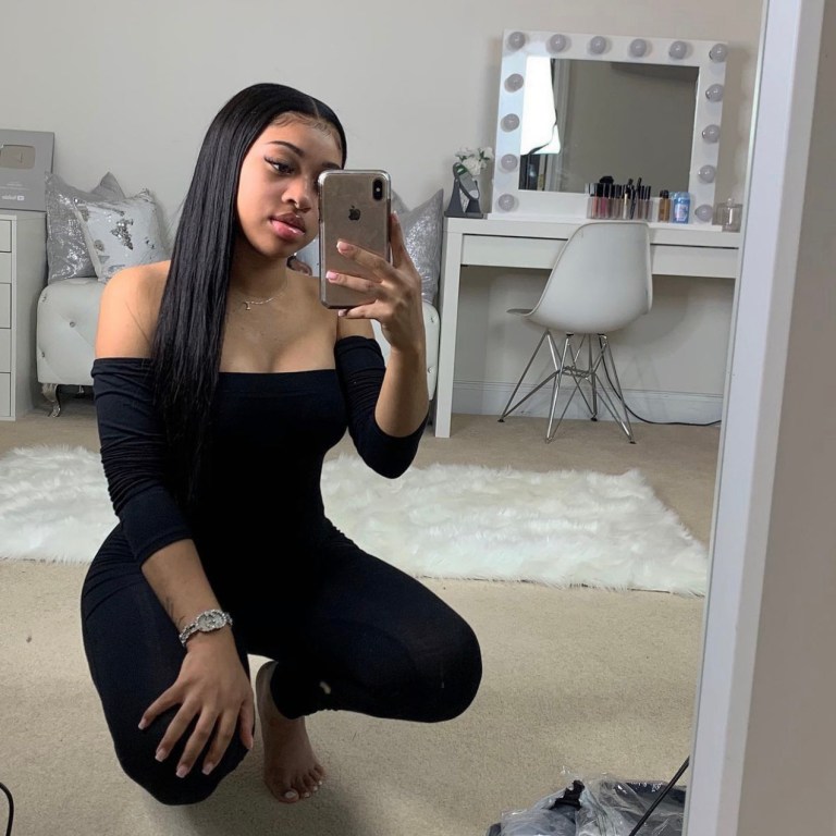 India Royale Spotted in Fashion Nova Black Off-The-Shoulder Jumpsuit