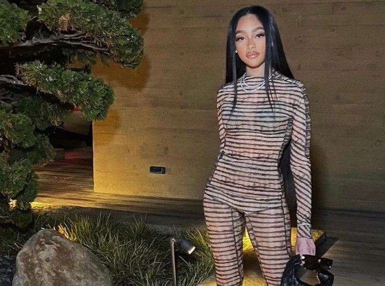 Jodie Woods Celebrates Her Birthday at Nobu Malibu Wearing KNWLS by Charlotte Knowles Beige Checked Top and Flared Pants Paired With Bottega Veneta Black Bag