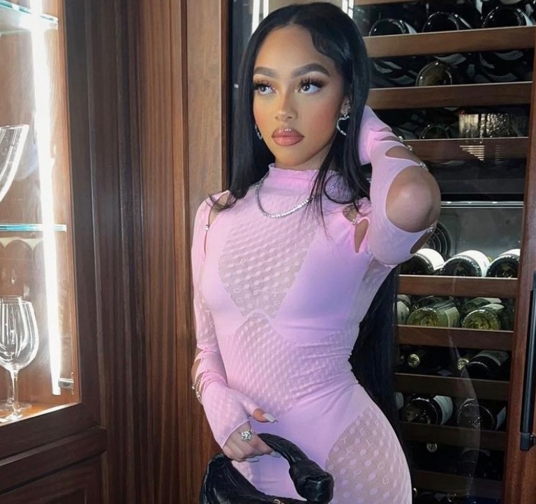 Jodie Woods Grabbed Dinner at Craig’s in LA Wearing Poster Girl Pink Polka Dot Lace Dress and Bottega Veneta Black Bag