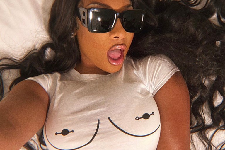Megan Thee Stallion Poses in Fashion Nova White Graphic Crop T-Shirt
