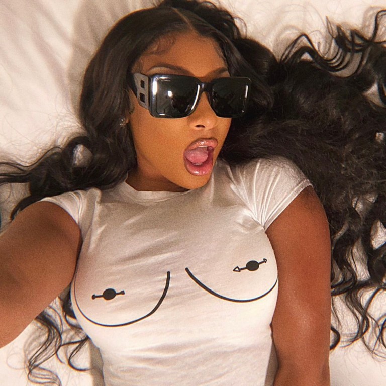 Megan Thee Stallion Poses in Fashion Nova White Graphic Crop T-Shirt