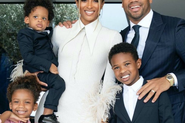 Ciara Poses with Family in White 16 Arlington Collared Feather Cuff Midi Dress