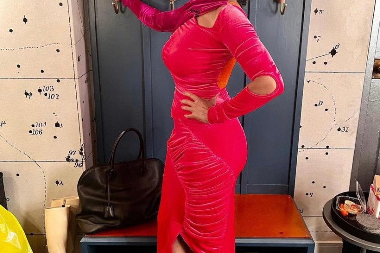 Tracee Ellis Ross Appears on the Tonight Show Wearing a Preen By Thornton Bregazzi Pink Cut Out Velvet Dress And Versace Platform Pumps